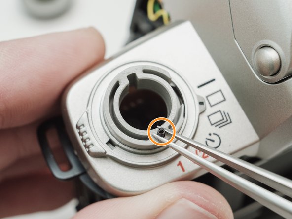 Pentax ZX-5n Exposure Compensation Dial Replacement, Remove detent components: crwdns2935265:016crwdnd2935265:02crwdnd2935265:02crwdne2935265:0