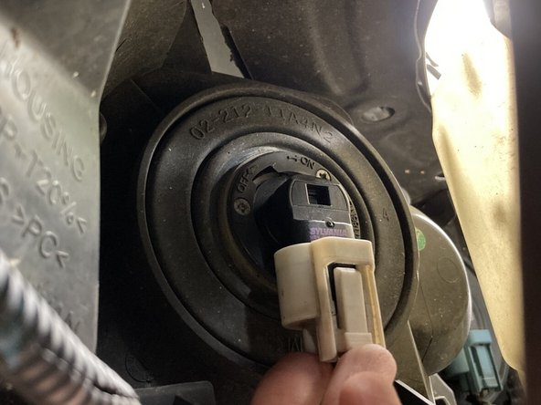 You should hear it click into place when it is secure.