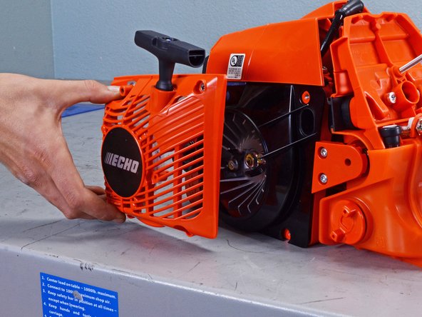 Echo Chain Saw CS590 2019 Starter Assembly Replacement, Remove the starter cover: crwdns2935265:014crwdnd2935265:03crwdnd2935265:03crwdne2935265:0