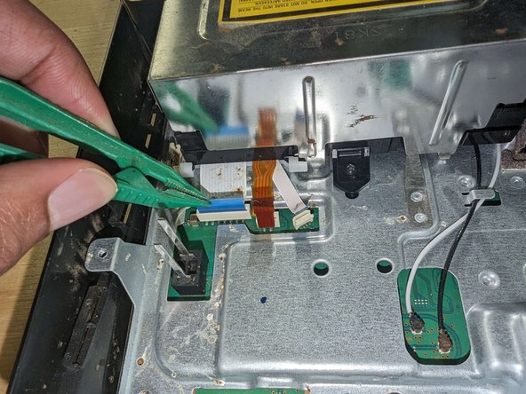 PlayStation 3 Slim Thermal Paste Replacement, Disconnect WiFi antenna & Blu-ray: crwdns2935265:010crwdnd2935265:02crwdnd2935265:02crwdne2935265:0