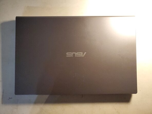 Asus X515 Wifi Card Replacement, Flip over laptop: crwdns2935265:01crwdnd2935265:01crwdnd2935265:02crwdne2935265:0