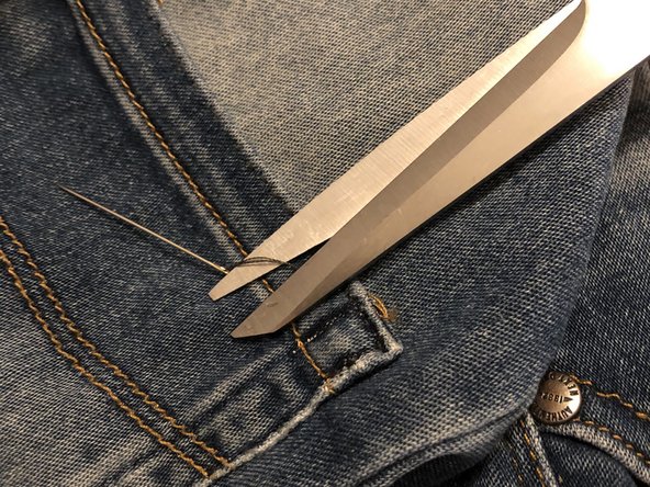 Mend a tear at the knee, by hand, with no-waste patch. Replacement: crwdns2935265:08crwdnd2935265:02crwdnd2935265:03crwdne2935265:0