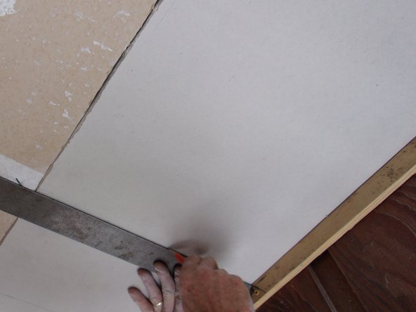 Trim the new piece or the existing ceiling edges if you need more room on a rafter to affix it securely.