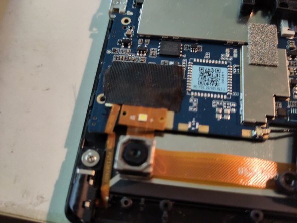 Pine64 PineTab 2 Touch & Front Glass Replacement, Remove the back camera holder and headphone jack: crwdns2935265:06crwdnd2935265:02crwdnd2935265:02crwdne2935265:0