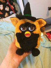 Why is my 1998 furby turning on then back off? - Furby - iFixit