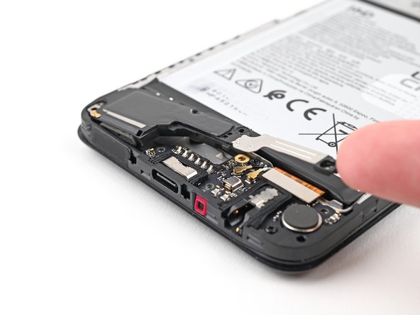 HMD Fusion Business Charging Board Replacement, Remove the loudspeaker: crwdns2935265:012crwdnd2935265:02crwdnd2935265:03crwdne2935265:0