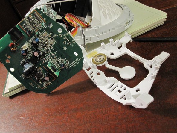 Disassembling Philips Wake-Up HF35xx Main PCB, Detach plastic holder: step 10, image 2 of 2