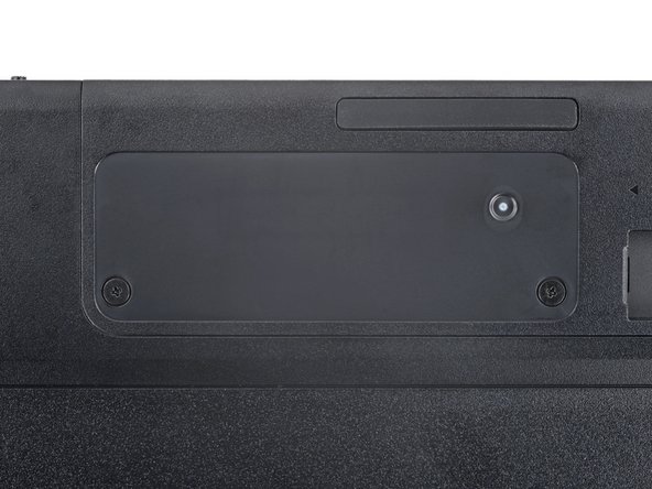 Logitech G915 TKL Battery Replacement, Remove the battery cover screws: crwdns2935265:04crwdnd2935265:02crwdnd2935265:02crwdne2935265:0