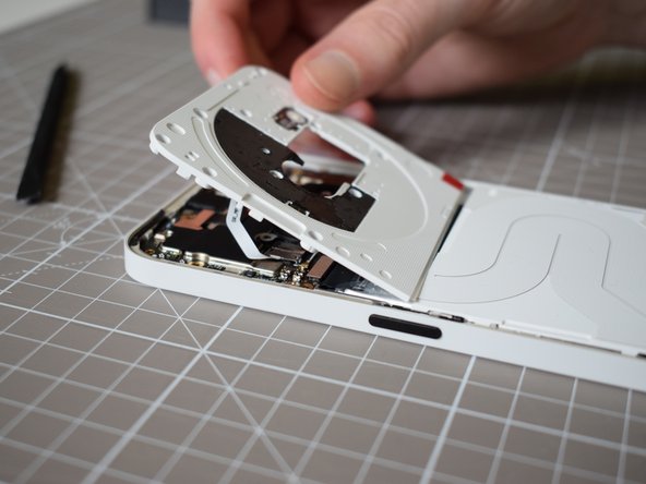 Nothing Phone (2a) Battery Replacement, Lift off the upper aesthetics panel: crwdns2935265:08crwdnd2935265:03crwdnd2935265:03crwdne2935265:0