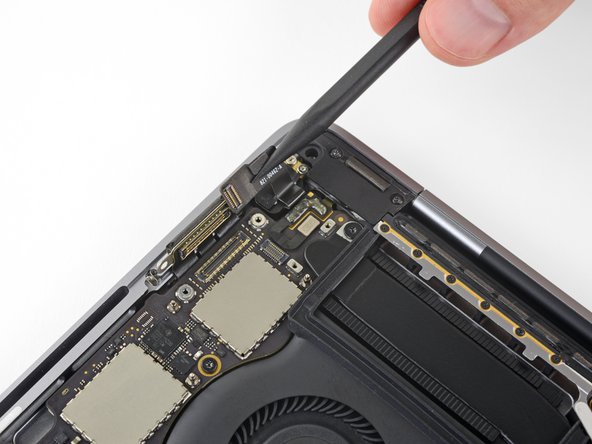MacBook Pro 13" Touch Bar Late 2016 Battery Replacement, Disconnect the headphone jack: step 35, image 3 of 3