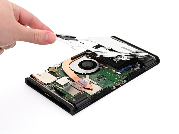 Nintendo Switch 2 Microphone Replacement, Lower the shield plate: crwdns2935265:043crwdnd2935265:01crwdnd2935265:02crwdne2935265:0