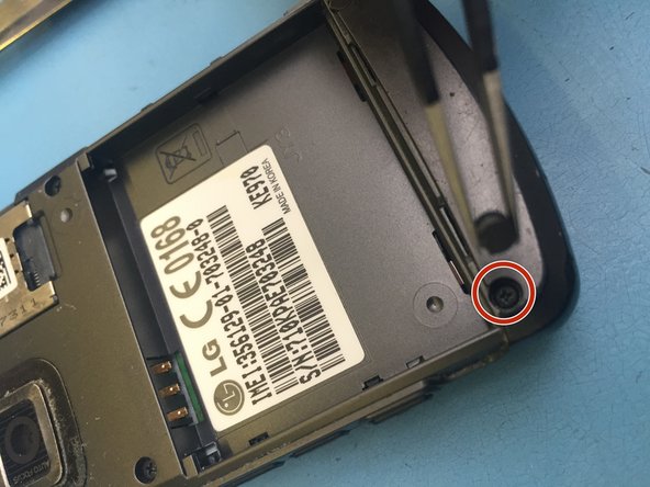 LG KE970 Teardown, Remove rubber screw covers: crwdns2935265:03crwdnd2935265:02crwdnd2935265:03crwdne2935265:0