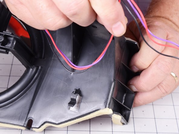 LG Refrigerator Evaporator Fan Replacement, Remove the fan motor: crwdns2935265:026crwdnd2935265:02crwdnd2935265:02crwdne2935265:0