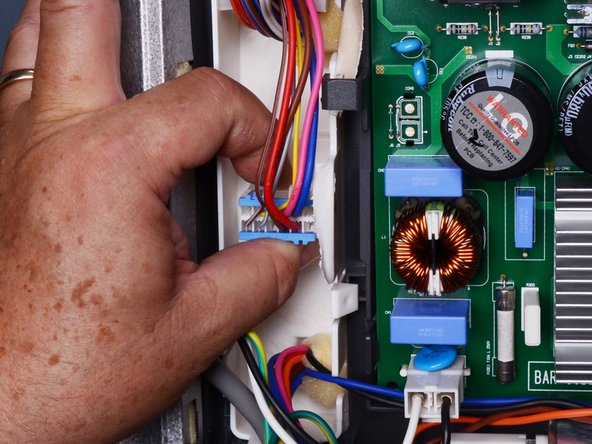 LG Refrigerator Ice Auger Motor Run Capacitor Replacement, Disconnect the wiring harness: crwdns2935265:04crwdnd2935265:02crwdnd2935265:03crwdne2935265:0