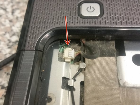 HP Compaq Presario V3000 Palmrest/Touchpad Replacement, Remove power button cover: step 9, image 2 of 2