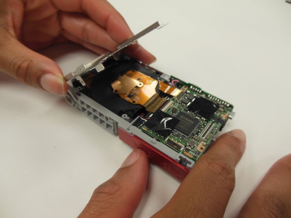 Kodak EasyShare M381 Battery Latch Replacement: crwdns2935265:014crwdnd2935265:02crwdnd2935265:03crwdne2935265:0