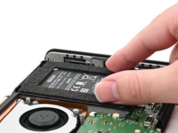 Nintendo Switch 2 Battery Replacement, Install the new battery: crwdns2935265:043crwdnd2935265:03crwdnd2935265:03crwdne2935265:0