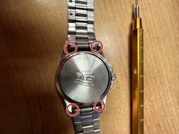 Casio 2784 Mtp-1215 Battery Replacement, Remove the Springbars from the case: step 2, image 1 of 3