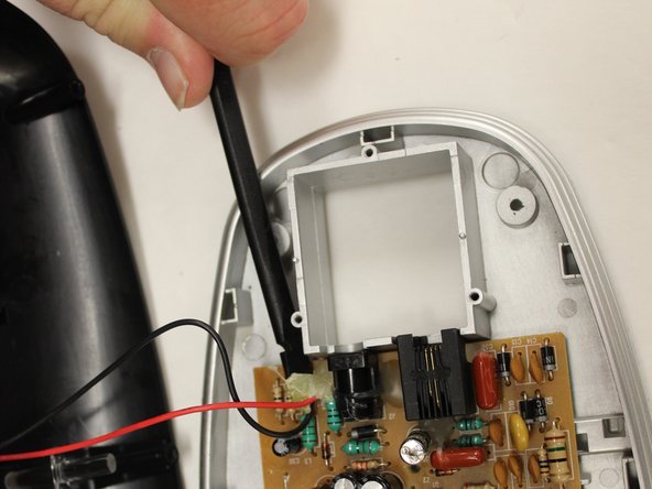 Polyconcept 900-MHz Retro Cordless Telephone Device Motherboard Replacement, Removing Glue Covering for Wire Connections: crwdns2935265:06crwdnd2935265:02crwdnd2935265:02crwdne2935265:0