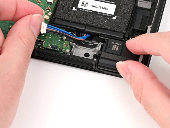 Nintendo Switch 2 Left Joy-Con 2 Connector Replacement, Install the left speaker: crwdns2935265:049crwdnd2935265:03crwdnd2935265:03crwdne2935265:0