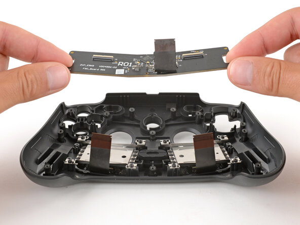 Steam Controller (2nd Gen, 2026) Buttons Replacement, Remove the FSC board: crwdns2935265:027crwdnd2935265:02crwdnd2935265:03crwdne2935265:0