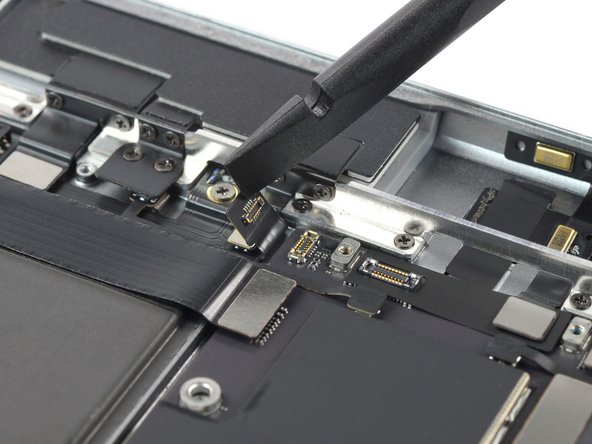 iPad Pro 12.9" 2nd Gen Battery Replacement, Disconnect the top left interconnect cable: crwdns2935265:043crwdnd2935265:02crwdnd2935265:02crwdne2935265:0