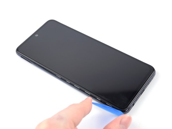 Xiaomi Redmi Note 10S Battery Replacement, Release the plastic clips: crwdns2935265:016crwdnd2935265:03crwdnd2935265:03crwdne2935265:0