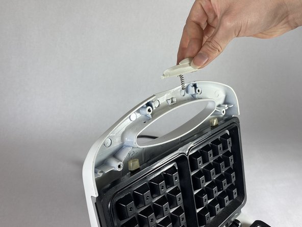 Kitchen Gourmet Waffle Maker Release Latch Spring Replacement: step 8, image 2 of 3