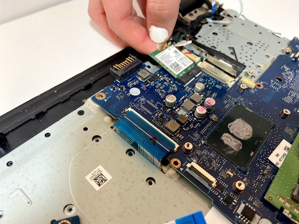 HP 15-ay114cy Motherboard Replacement, Remove the Wireless Card: crwdns2935265:014crwdnd2935265:02crwdnd2935265:03crwdne2935265:0