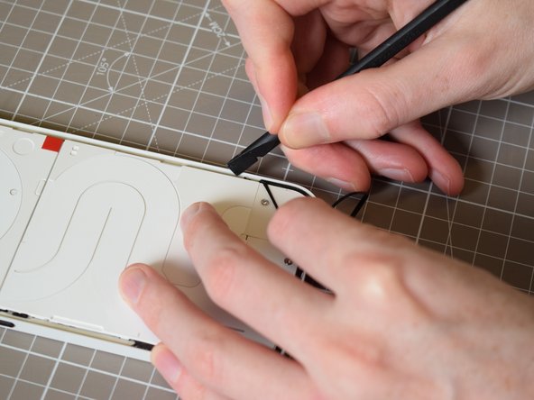 Nothing Phone (2a) Battery Replacement, Remove residue glue: crwdns2935265:036crwdnd2935265:02crwdnd2935265:03crwdne2935265:0