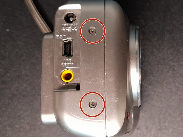 Olympus FE-115 Case removal, Unscrew: crwdns2935265:03crwdnd2935265:02crwdnd2935265:03crwdne2935265:0