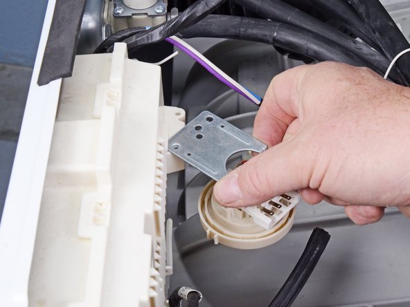 LG Front Load Washing Machine Pressure Sensor Replacement, Remove the pressure sensor: crwdns2935265:08crwdnd2935265:02crwdnd2935265:03crwdne2935265:0