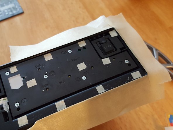 How to fix touch buttons on Sony SRS-X7, Apply masking tape to the cover and bezel.: crwdns2935265:06crwdnd2935265:02crwdnd2935265:02crwdne2935265:0