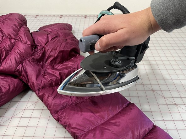 Release a Snagged Stitch on an Insulated Jacket, Quality control: crwdns2935265:04crwdnd2935265:03crwdnd2935265:03crwdne2935265:0