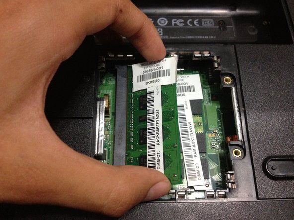 HP G60 RAM Replacement, Eject RAM: step 3, image 2 of 3