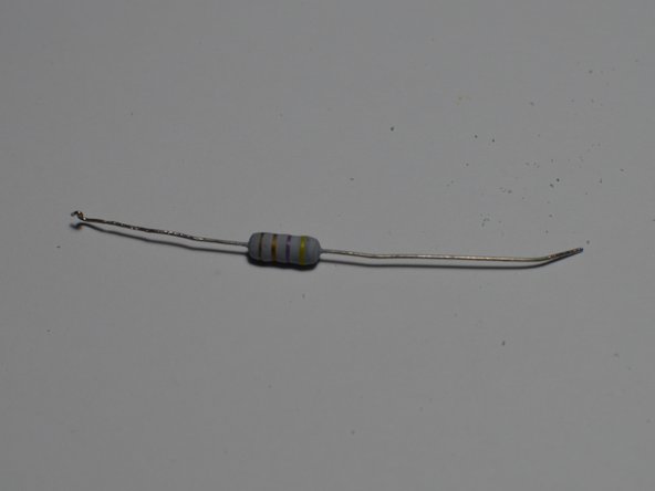 LED Light Bulb Teardown, Remove Resistor: crwdns2935265:06crwdnd2935265:03crwdnd2935265:03crwdne2935265:0