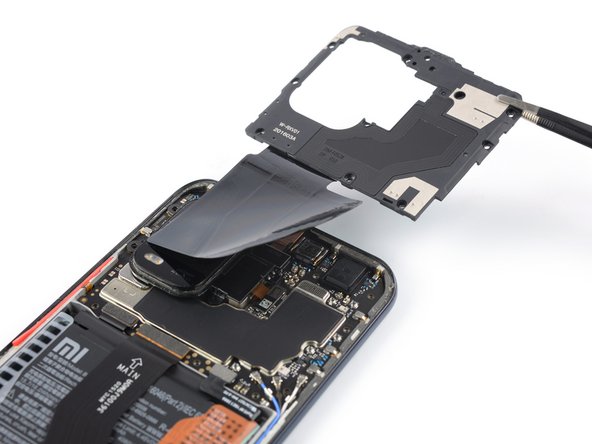 Xiaomi Mi 10 Lite Screen Replacement, Remove the motherboard cover: crwdns2935265:010crwdnd2935265:02crwdnd2935265:02crwdne2935265:0