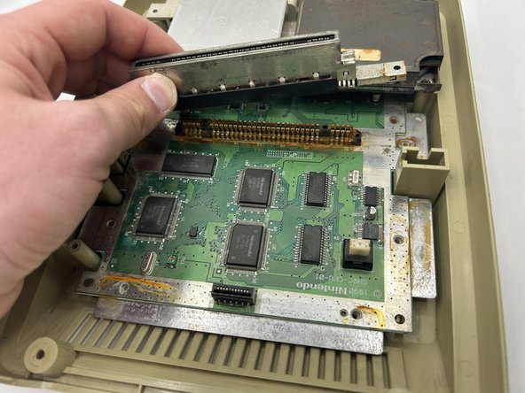 Nintendo Super Famicom SHVC-001 Cartridge Port Replacement: crwdns2935265:07crwdnd2935265:02crwdnd2935265:02crwdne2935265:0