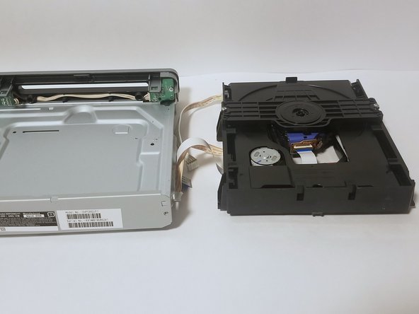 Philips DVP5992-F7 Tray Replacement: crwdns2935265:09crwdnd2935265:02crwdnd2935265:02crwdne2935265:0