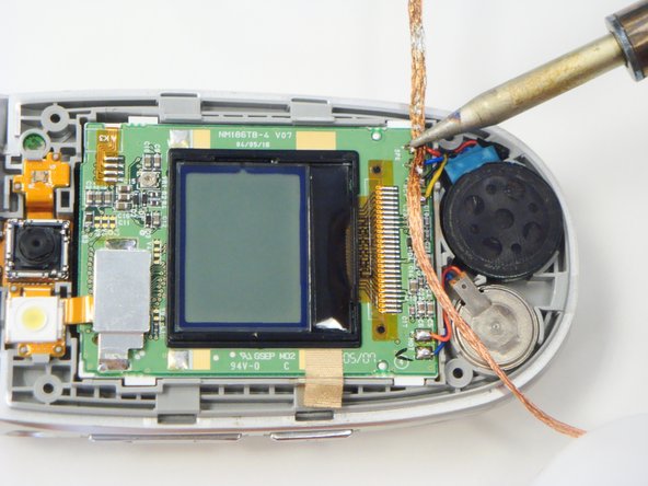 LG VX6100 Speaker Replacement, Speaker: crwdns2935265:05crwdnd2935265:02crwdnd2935265:02crwdne2935265:0