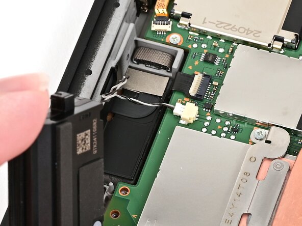 Nintendo Switch 2 Speakers Replacement, Connect the right speaker: crwdns2935265:043crwdnd2935265:02crwdnd2935265:03crwdne2935265:0