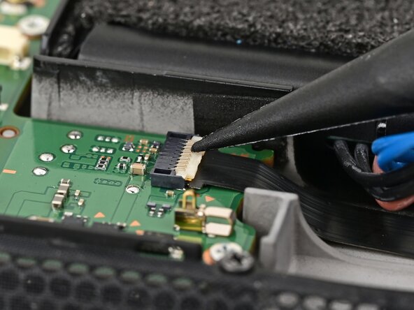 Nintendo Switch 2 Board Replacement, Connect the left Joy‑Con 2 cable: crwdns2935265:064crwdnd2935265:03crwdnd2935265:03crwdne2935265:0