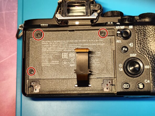 Sony A7 II Top Flex Cable replacement, Removing the front shell: crwdns2935265:011crwdnd2935265:01crwdnd2935265:03crwdne2935265:0