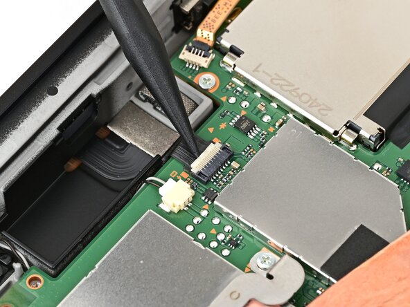 Nintendo Switch 2 Right Joy-Con 2 Connector Replacement, Disconnect the right Joy‑Con 2 connector cable: crwdns2935265:035crwdnd2935265:01crwdnd2935265:03crwdne2935265:0