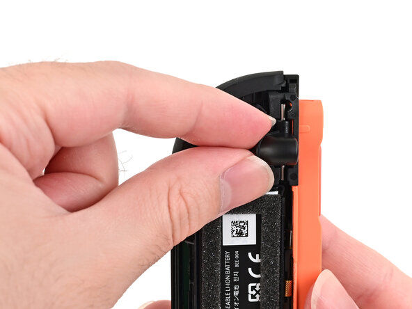 Joy-Con 2 (Right) Joystick Replacement, Remove the release button: crwdns2935265:013crwdnd2935265:01crwdnd2935265:02crwdne2935265:0