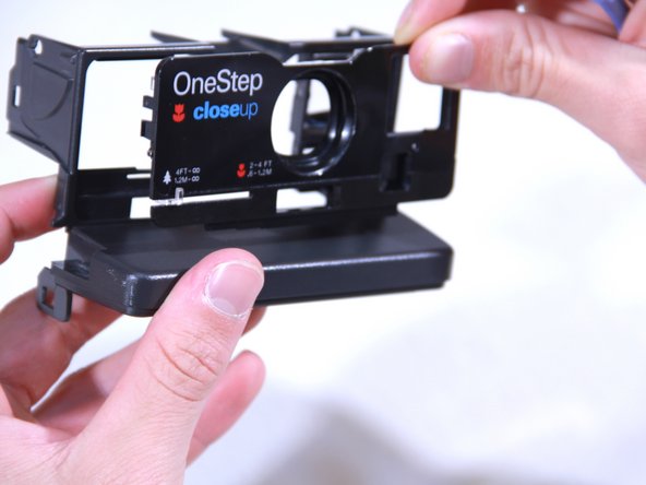 Polaroid Onestep Close Up Close Up Lens Replacement, Removing the Face Plate: crwdns2935265:05crwdnd2935265:03crwdnd2935265:03crwdne2935265:0