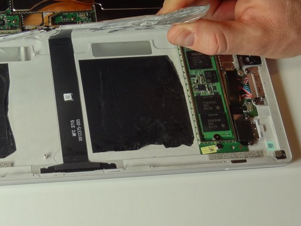 Peel the battery up and away from the bottom of the device.