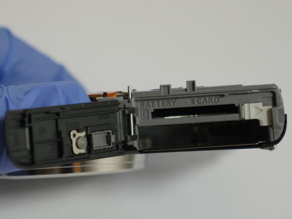 Panasonic Lumix DMC-FH27 Door Replacement, Pulling out the rod: crwdns2935265:013crwdnd2935265:02crwdnd2935265:03crwdne2935265:0