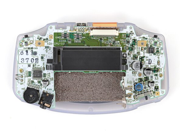 Game Boy Advance Speaker Replacement, Remove the motherboard screws: crwdns2935265:011crwdnd2935265:02crwdnd2935265:02crwdne2935265:0