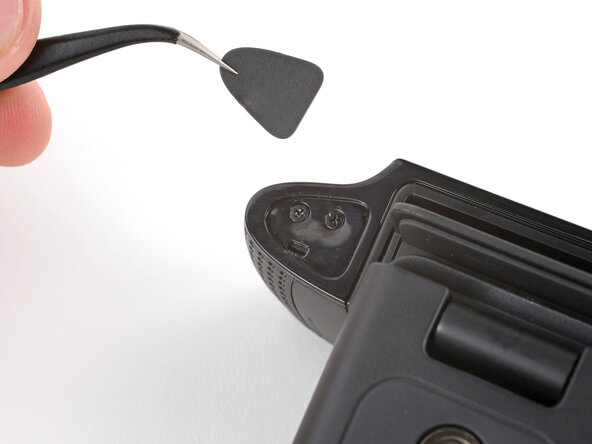 How to Open Your Logitech C920s Webcam, Remove the screw covers: crwdns2935265:02crwdnd2935265:03crwdnd2935265:03crwdne2935265:0